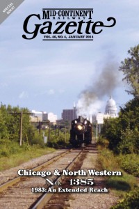 Cover of Mid-Continent Railway Gazette No. 46, No. 4. The issue recounts the C&NW 1385's travels around the Upper Midwest in 1983. Cover photo by Brian Allen shown is the 1385 leaving the Wisconsin State Capitol behind on Sept. 6, 1983.