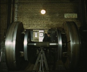 Worn tires are reprofiled on a wheel lathe at the Chicago & North Western 40th Street shops in Chicago in Dec. 1942. C&NW 1385's drivers will be turned on a wheel lathe similar to this one. Jack Delano photo. Library of Congress collection.