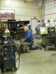 volunteer operating hydraulic jack