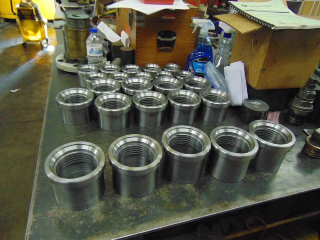 washout couplings arrayed on table
