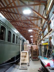 Car shop aisle with bright lighting