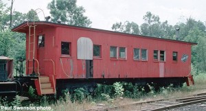 C&NW 10208 drovers caboose before restoration, 8/83, 35mm Kodachrome transparency. Paul Swanson photo.