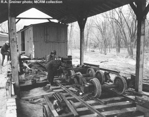 putting narrow gauge C&NW boxcar under display shed roof, no date; R.A. Greiner photo; MCRM collection