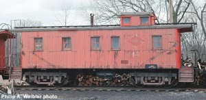 C&NW #12476 wooden caboose (ex LS&I), roster view, May 1972.  Ektachrome 2x2 transparency.  Philip A. Weibler photo