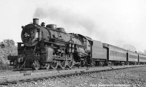DL&W eastbound train leaving Patterson, NJ, July 26, 1949 with "Boonton" coaches.   Paul Swanson collection