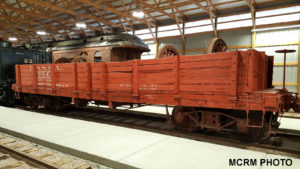 red wood gondola car inside display building lettered DSS&A number 996